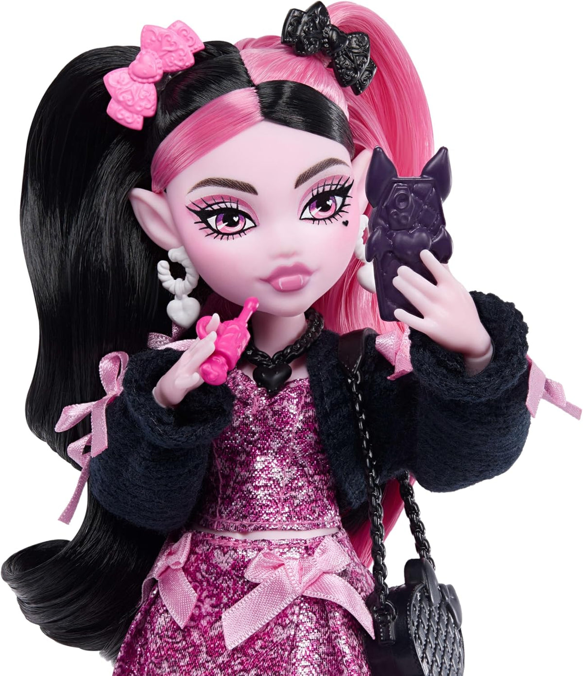 Muñeca Monster High, Draculaura en vestido de lazo rosa y chaqueta...