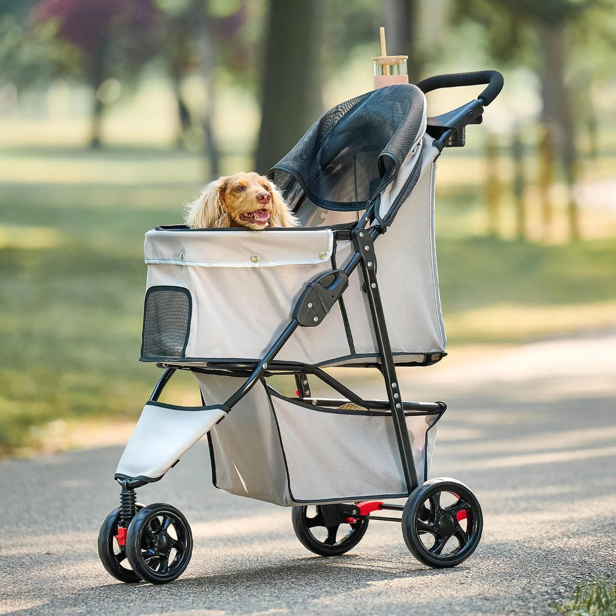 Carlson Pet Products Stroller, Incluye Rueda Delantera Giratoria de 360 Grados, Frenos en las Ruedas Traseras, ribete Reflectante, Paneles de Malla, Paraguas y Cabina de Malla, Caqui