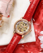 ROCOSJEWE Reloj de pulsera automático mecánico de lujo para mujer, esfera esqueletizada en oro rosado, manecillas luminiscentes, correa de cuero roja, reloj de vestir de moda para mujer, reloj esqueletizado autofaciente resistente al agua, regalo para