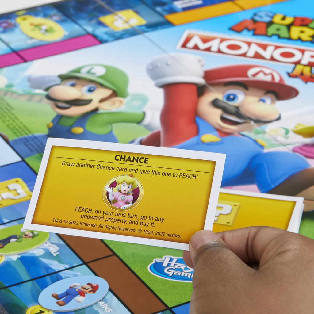 Juego de mesa Monopoly Junior Edición Super Mario, Diversión para niños de 5 años en adelante, Explora el Reino de los Hongos como Mario, Peach, Yoshi o Luigi (Exclusivo de Amazon)
