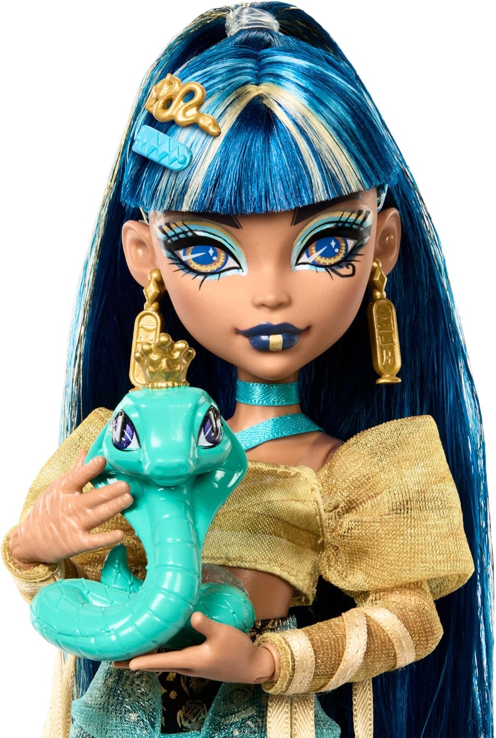 Muñeca Monster High Cleo De Nile con blusa dorada y falda de capas,...