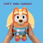 Dress &amp; Play Baby Bingo Bluey de Peluche, Botón, Cremallera, He...