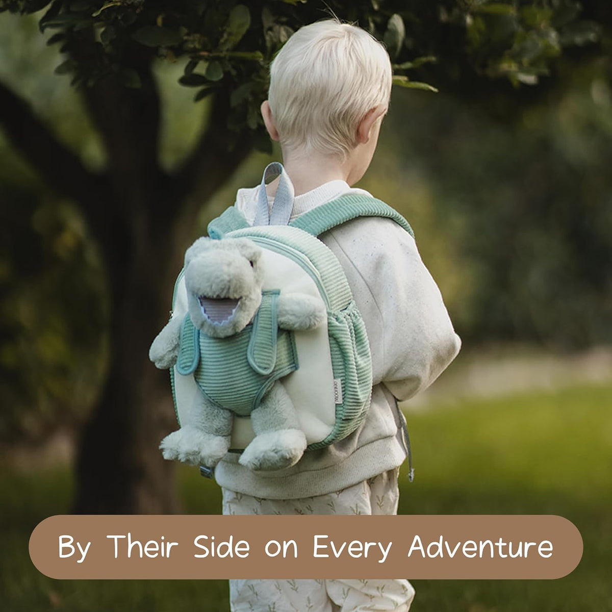 Moonkie Hug & Go - Mochila de dinosaurio para niños, bolsa de felpa suave con juguete para llevar para niños de 2 a 4 años, ideal para guardería, viajes y regalos de cumpleaños