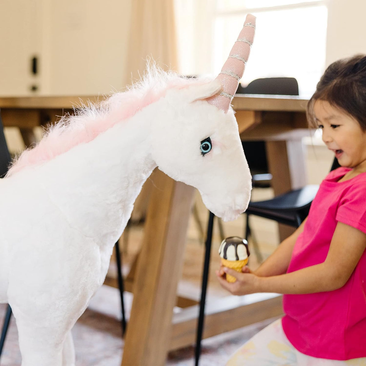 Unicornio de peluche Melissa & Doug, otro
