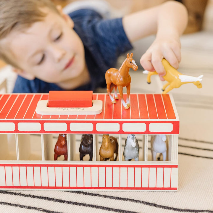 Establo de madera de juguete con 8 caballos, de Melissa &amp; Doug