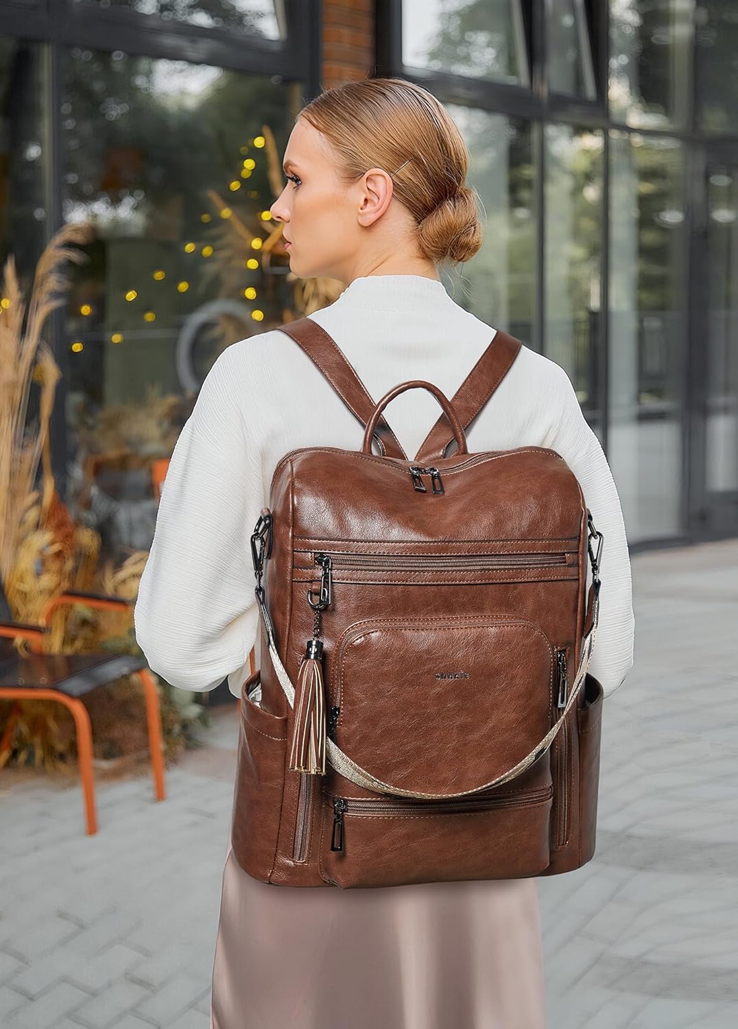 Mochila Shrrie de cuero vegano para computadora portátil de 14 pulg...