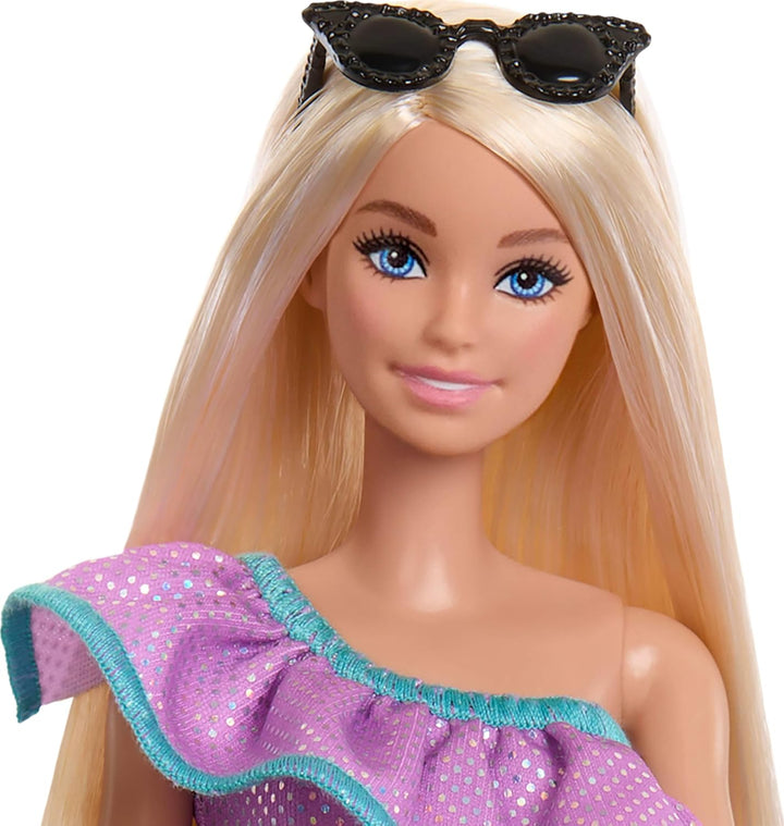Muñeca Barbie con ropa y accesorios