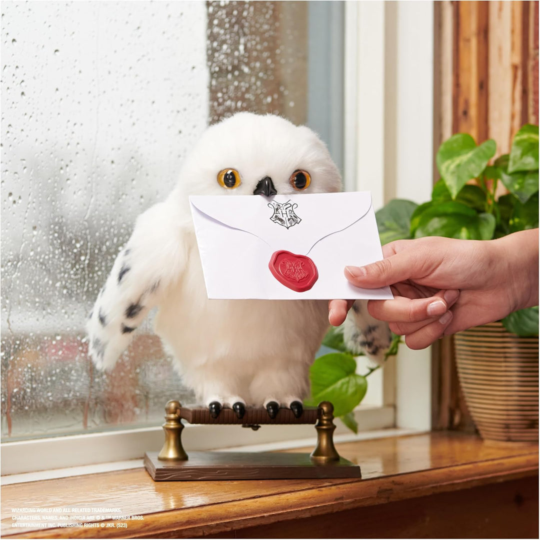 Wizarding World Harry Potter, lechuza interactiva Enchanting Hedwig...