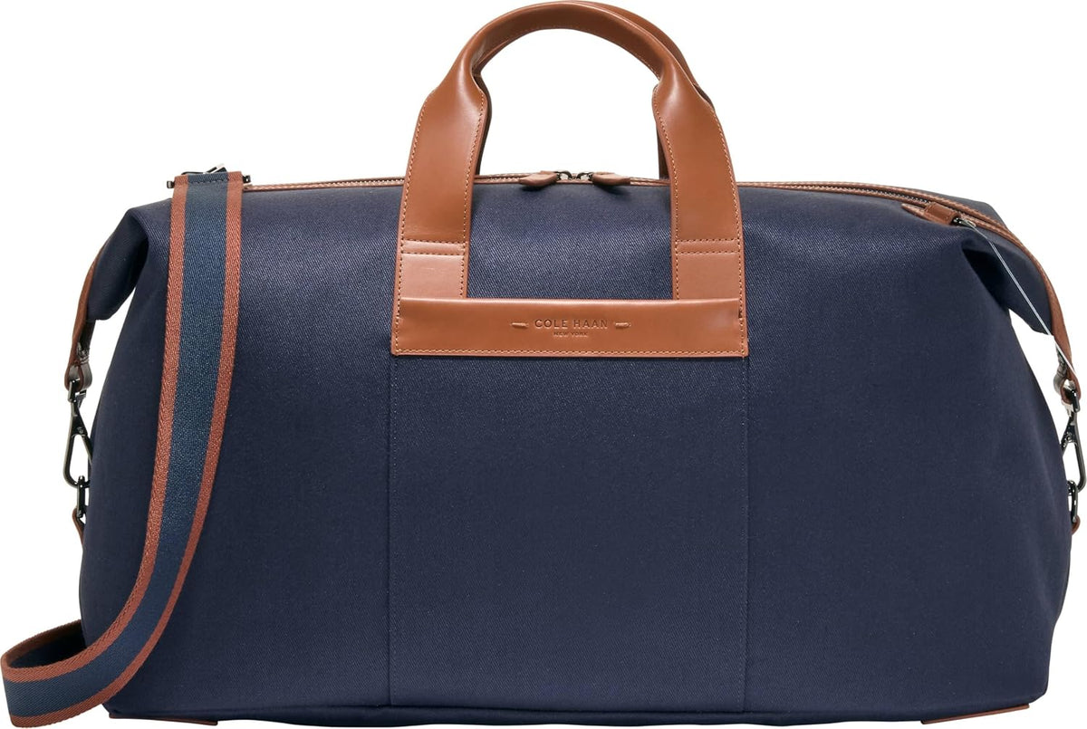 Cole Haan Judson - Bolsa de lona de sarga cepillada para hombre, Luna de medianoche/Nuevo bronceado británico, Judson - Bolsa de lona de sarga cepillada