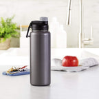 Amazon Basics Botella de agua grande aislada de acero inoxidable, tapa de boquilla a prueba de fugas, sin BPA, aislada al vacío, mantiene las bebidas frías, portátil, 30.1 onzas, gris