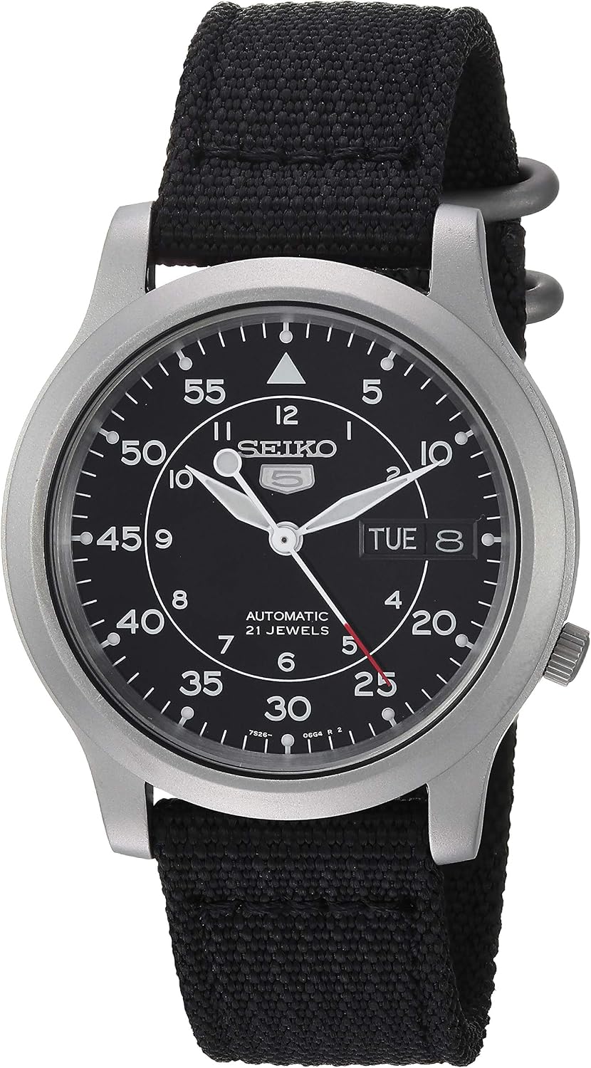 Seiko SNK809 reloj de acero inoxidable plateado automático con correa de lona negra para hombre