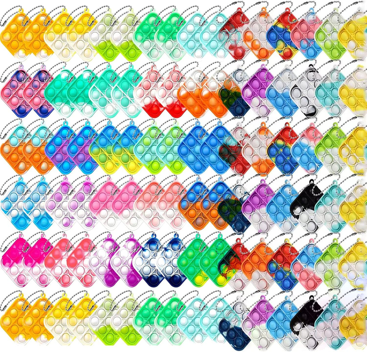 100 piezas de mini llavero de color aleatorio, juguete sensorial de silicona para apretar burbujas que hacen divertido para niños, alivio de ansiedad y estrés para adultos