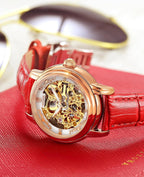 ROCOSJEWE Reloj de pulsera automático mecánico de lujo para mujer, esfera esqueletizada en oro rosado, manecillas luminiscentes, correa de cuero roja, reloj de vestir de moda para mujer, reloj esqueletizado autofaciente resistente al agua, regalo para