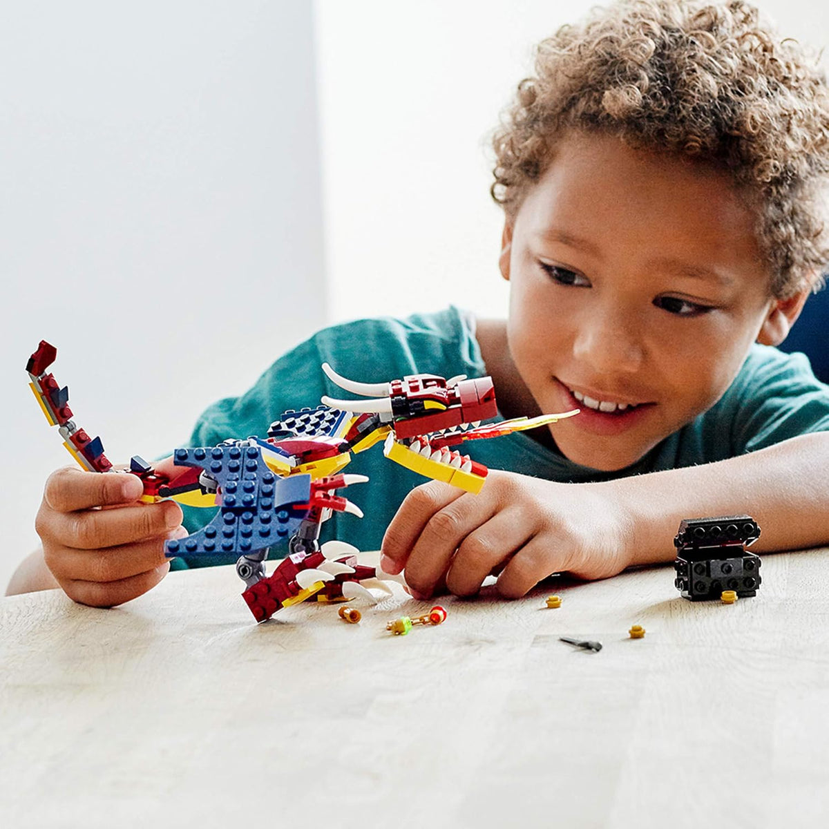 LEGO Creator 31102 - Kit de construcción de dragón de fuego 3 en 1, juguete genial para construir para niños (234 piezas)