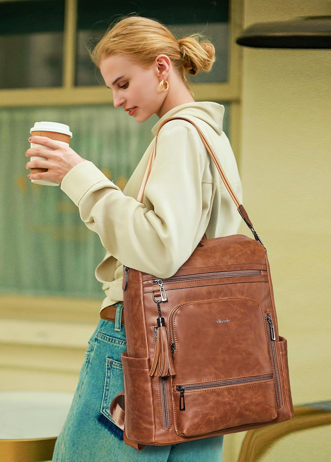 Mochila Shrrie de cuero vegano para computadora portátil de 14 pulg...
