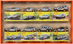 Matchbox Cars, juego de 8 autos fundidos a presión en escala 1:64 con decoraciones de primera calidad, incluyendo 1 vehículo exclusivo, neumáticos de agarre verdadero, acabado en tono platino