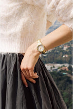 Reloj Bulova para mujer de acero inoxidable con cristal de 3 manecillas, mecanismo de cuarzo, esfera de nácar blanca