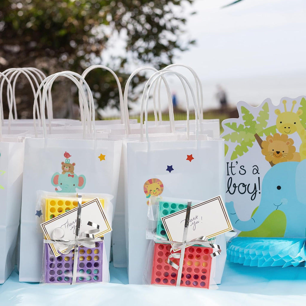 THE TWIDDLERS Paquete de 24 mini juegos de mesa cuatro en una fila, juguetes a granel (4 colores), regalos de regreso para niños para juegos de fiesta de cumpleaños, mini juegos de viaje para niños