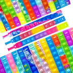 Paquete de 100 pulseras para ansiedad a granel, duraderas y ajustables, pulseras de presión multicolor para niños y adultos, juguetes a granel