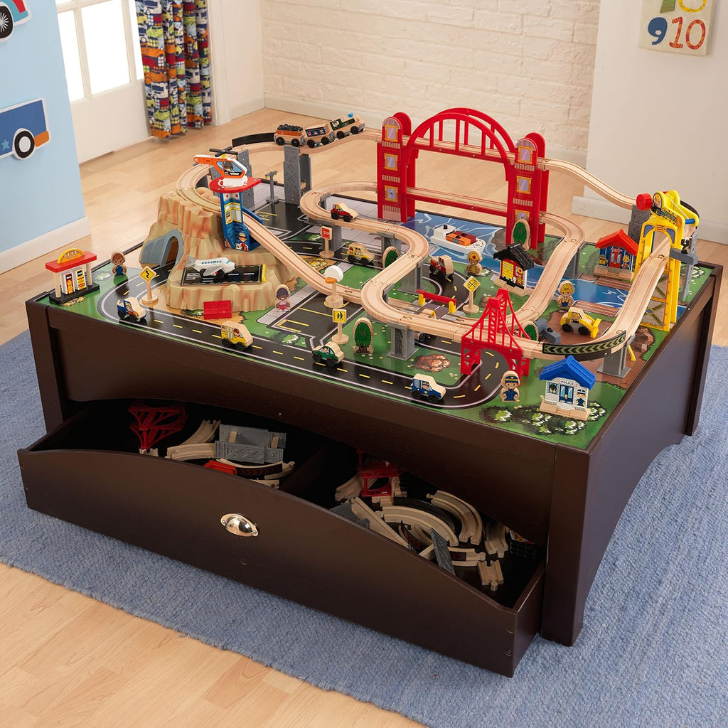 KidKraft Metropolis - Juego de tren de madera y mesa con 100 piezas y cajón de almacenamiento, color espresso