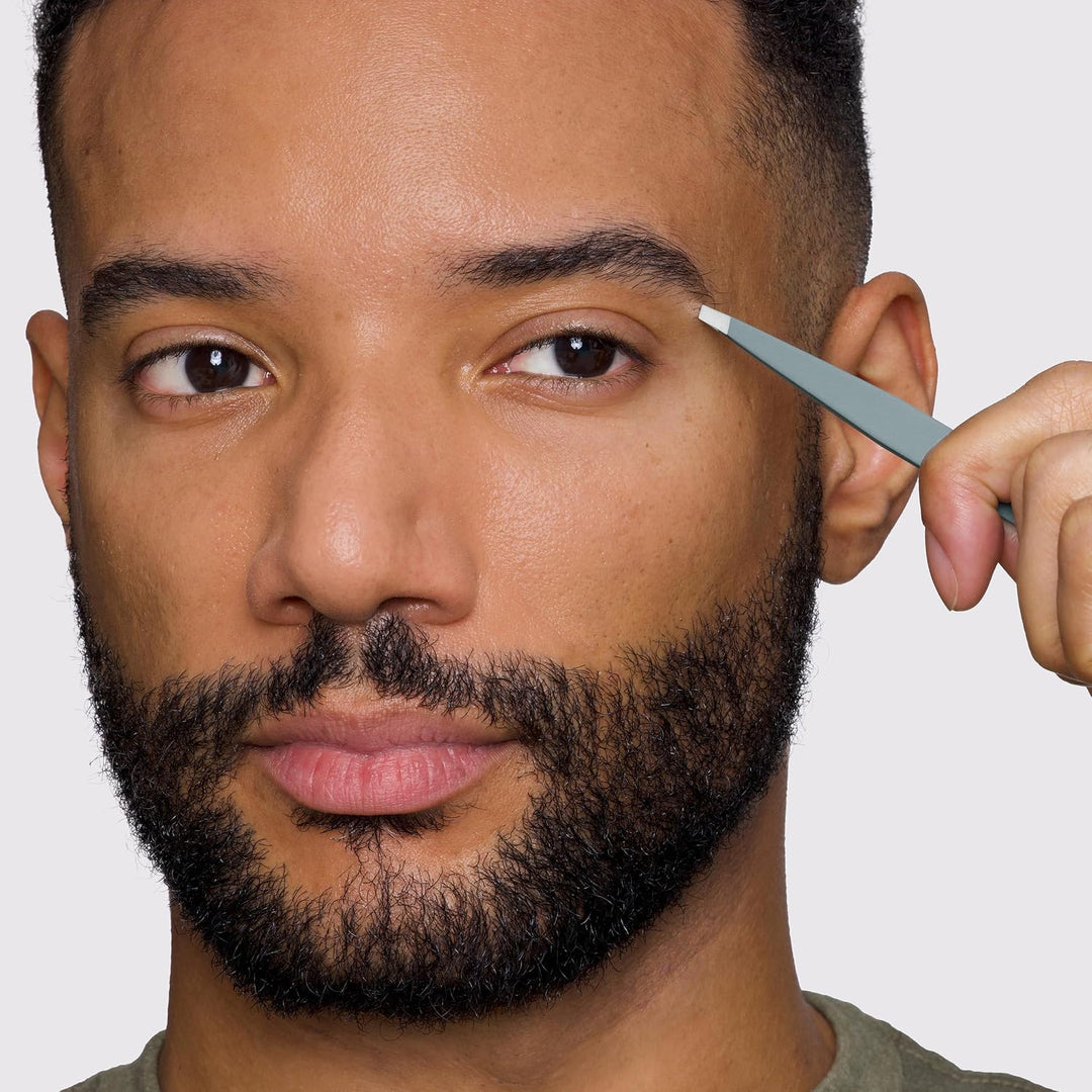 Tweezerman - Pinza para cejas inclinada Mist Blue de acero inoxidab...