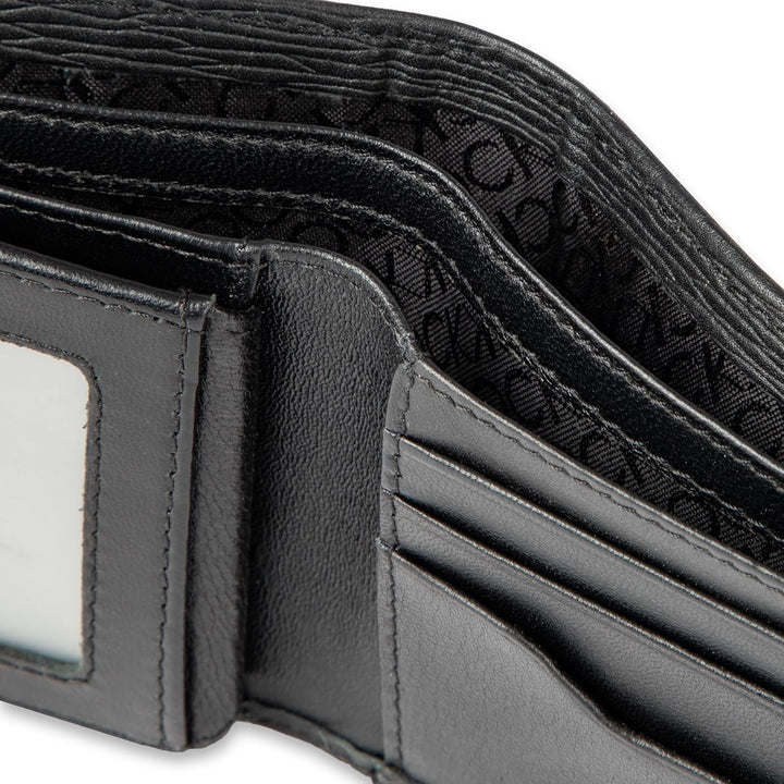 Calvin Klein Billetera plegable minimalista de piel RFID para hombr...