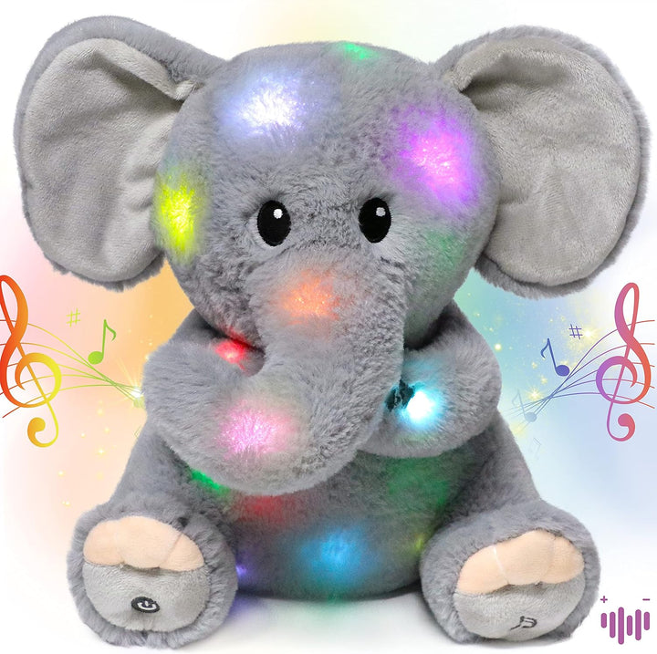 Hopearl Elefante de peluche musical LED que ilumina y canta, volume...