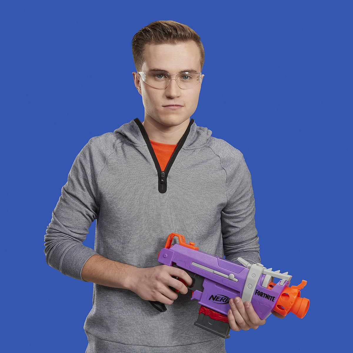 Nerf Fortnite SMG-E Blaster - Lanzamiento de dardos motorizado - Cargador de 6 dardos, 6 dardos Elite oficiales - para jóvenes, adolescentes y adultos