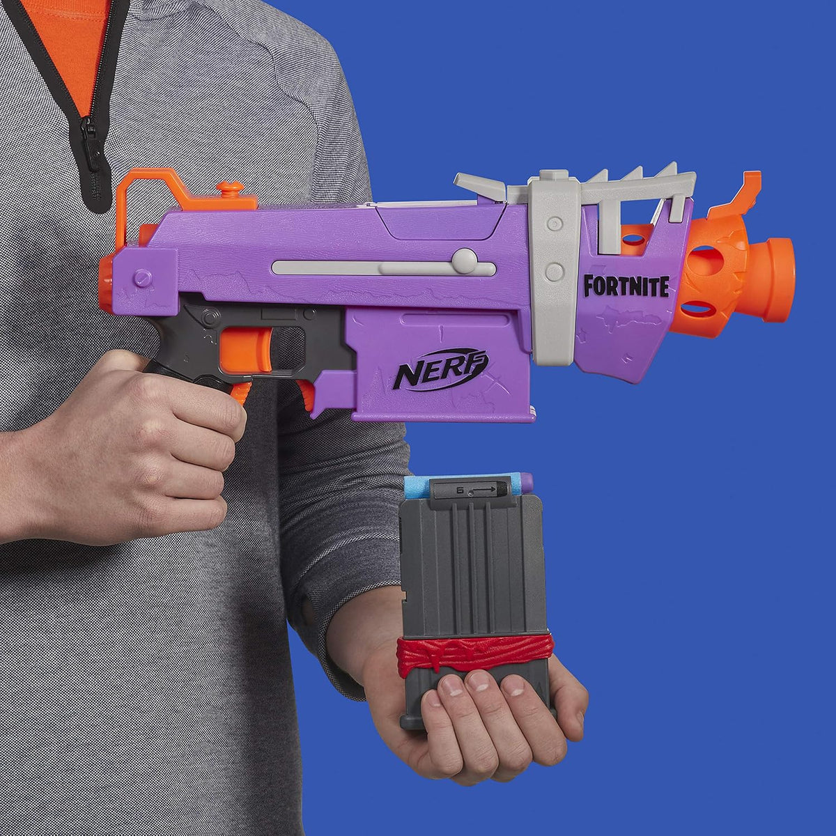 Nerf Fortnite SMG-E Blaster - Lanzamiento de dardos motorizado - Cargador de 6 dardos, 6 dardos Elite oficiales - para jóvenes, adolescentes y adultos