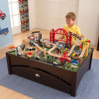 KidKraft Metropolis - Juego de tren de madera y mesa con 100 piezas y cajón de almacenamiento, color espresso